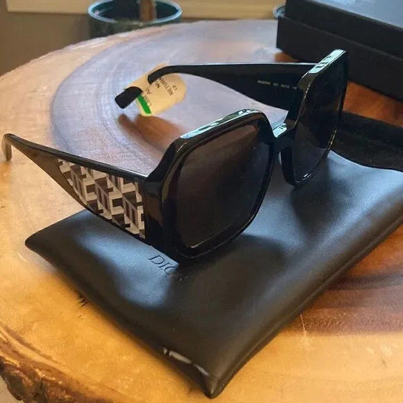 MCM NEW MCM 709S 002 Black Sunglasses With Anniversary Print On Temple